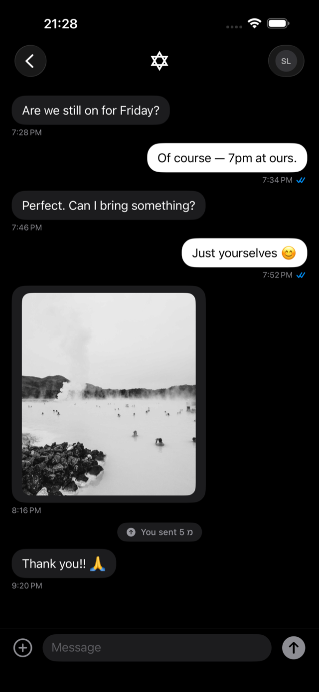 A conversation — text, photo and מ sent inside the thread